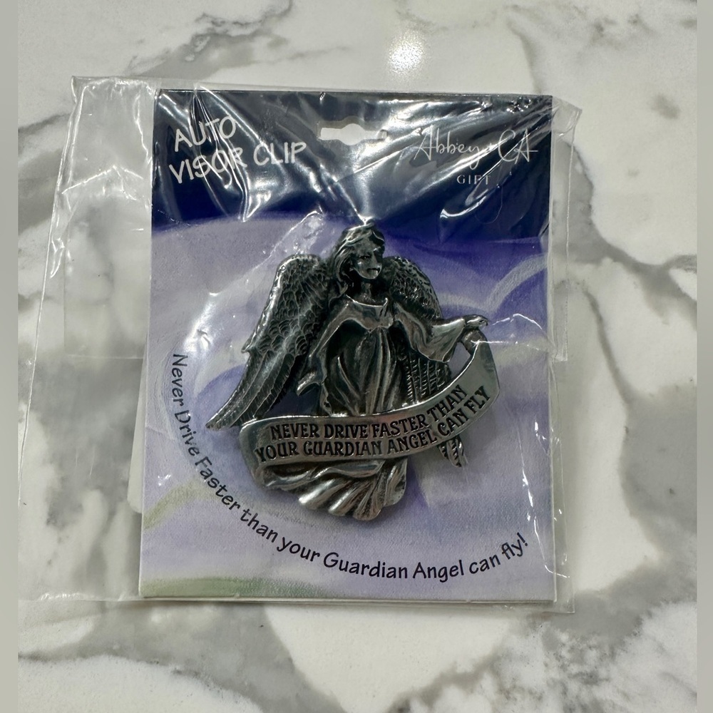 Auto visor clip never drive faster than your guardian angel can fly
